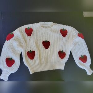 Unbranded white with big, fluffy red strawberries crew-neck sweater
